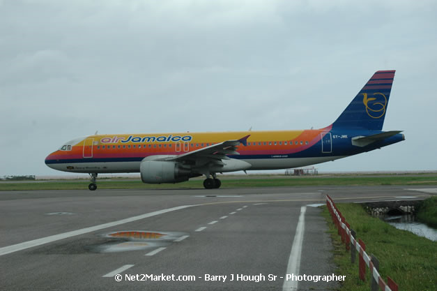 Air Jamaica Airline - Landing & Take Off - MBJ Airports Limited - Sangster International Airport - Domestic Terminal - Montego Bay, St James, Jamaica W.I. - MBJ Limited - Transforming Sangster International Airport into a world class facility - Photographs by Net2Market.com - Negril Travel Guide, Negril Jamaica WI - http://www.negriltravelguide.com - info@negriltravelguide.com...!