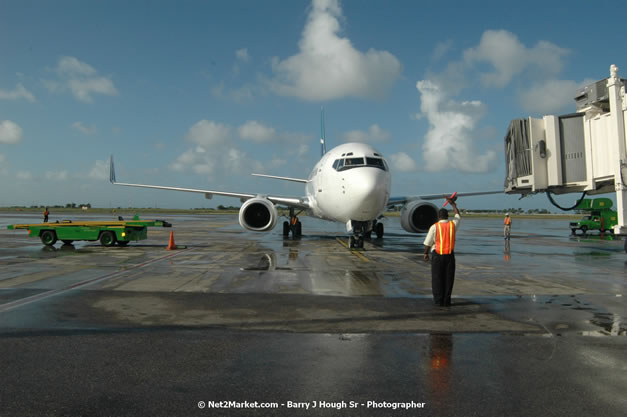 MBJ Airports Limited Welcomes WestJet Airlines - Inaugural Scheduled Service From Toronto Pearsons International Airport - Monday, December 10, 2007 - Sangster International Airport - MBJ Airports Limited, Montego Bay, Jamaica W.I. - Photographs by Net2Market.com - Barry J. Hough Sr, Photographer - Negril Travel Guide, Negril Jamaica WI - http://www.negriltravelguide.com - info@negriltravelguide.com...!