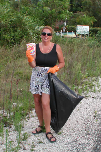 Volunteers Clean-Up Roadside Entrance to Negril - Negril Travel Guide