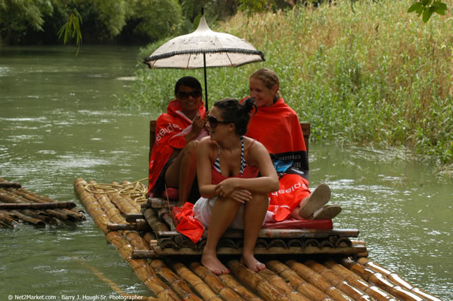 Rafting on the Martha Brae - Virgin Atlantic Inaugural Flight To Montego Bay, Jamaica Photos - Sir Richard Bronson, President & Family, and 450 Passengers - Rafting on the Martha Brae - Tuesday, July 4, 2006 - Negril Travel Guide, Negril Jamaica WI - http://www.negriltravelguide.com - info@negriltravelguide.com...!